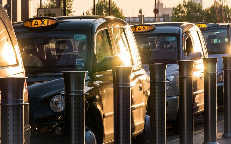 Row of parked Hackney cabs