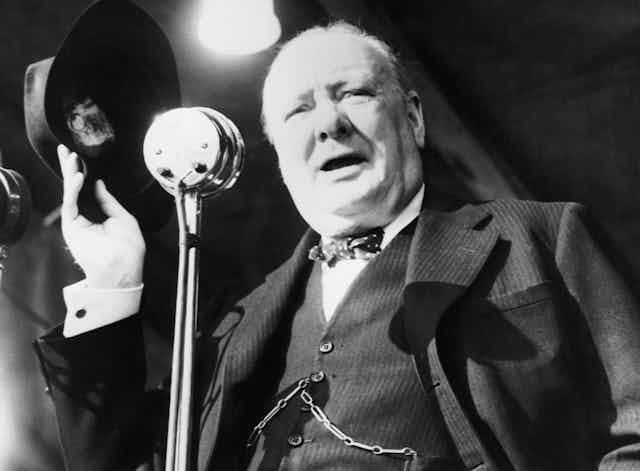 Photo of British Prime Minister Winston Churchill campaigning for election in 1945.