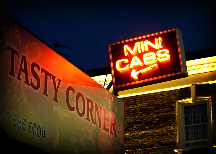 Neon minicab sign