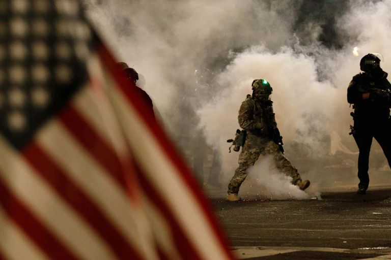 Federal officers using tear gas at an anti-racism protest in Portland, Oregon on July 21.