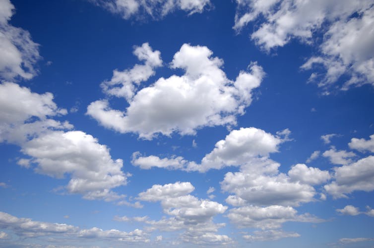 Cumulus clouds in blue sky