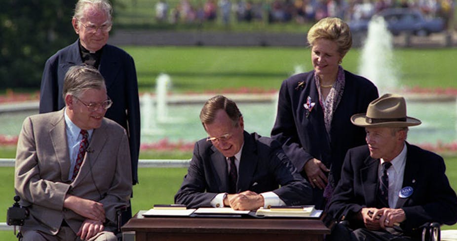 George H.W. Bush signs the ADA into law.
