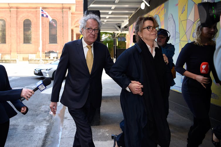 Actor Geoffrey Rush and his wife Jane Menelaus at the Federal Court.