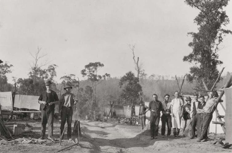 Group of men standing at 'sustenance' work site during Great Depression