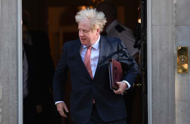 Boris Johnson leaving Downing Street.