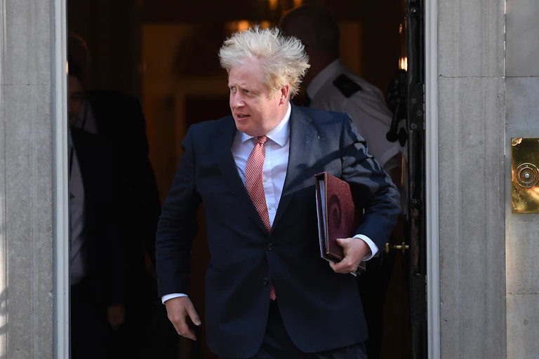 Boris Johnson leaving Downing Street.