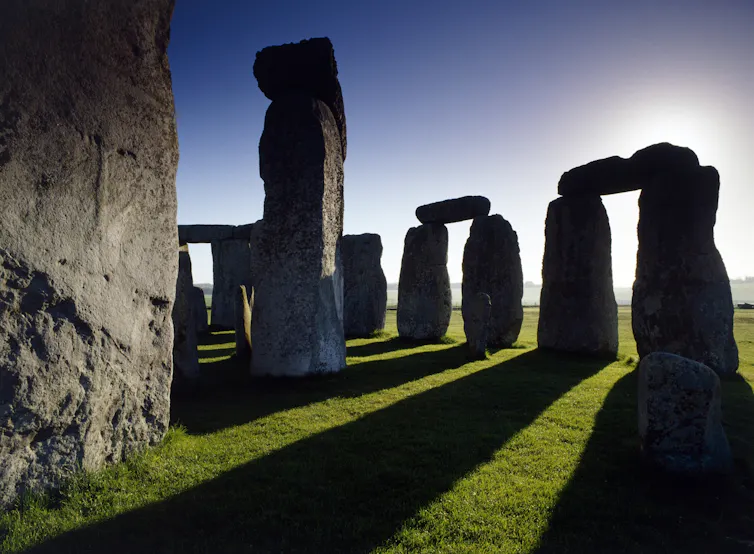Part of Stonehenge casting shadows.
