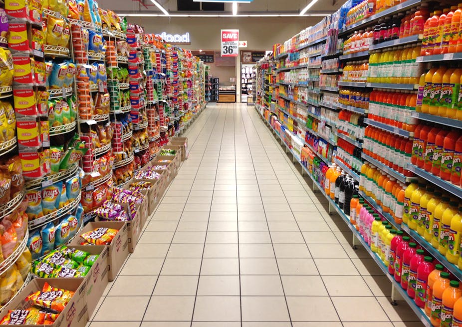 grocery store with groceries in aisle