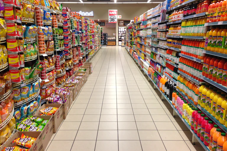 grocery store with groceries in aisle