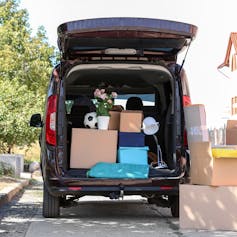 Small van packed with household belongings