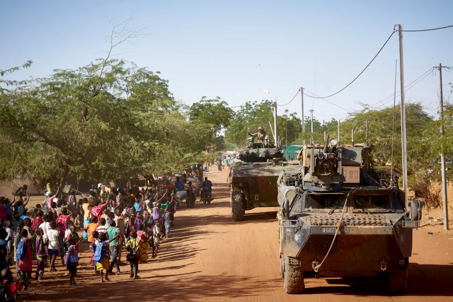 Armoured personnel carriers on the road in Burkina Faso