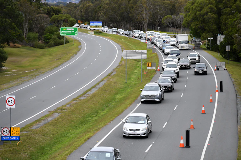 Traffic stretched along a highway at a stand still