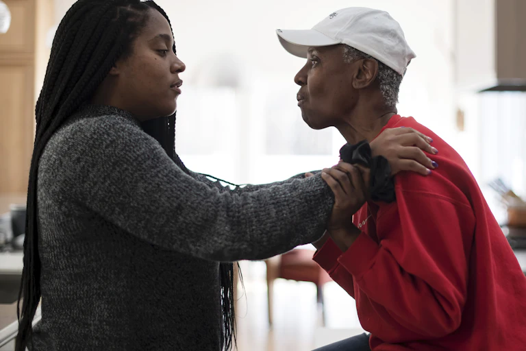 A daughter and her mother with Alzheimer's disease.