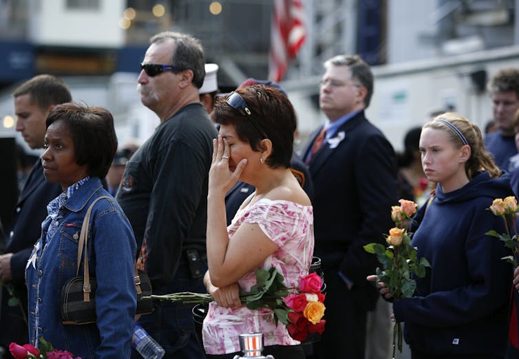 Person crying at memorial service