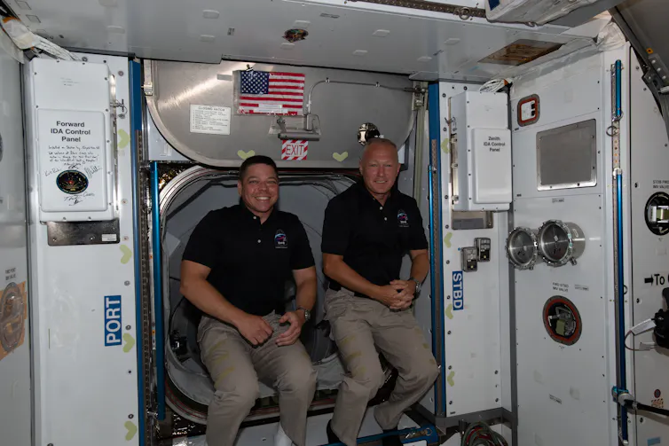 Picture of astronauts Bob and Doug at the ISS.