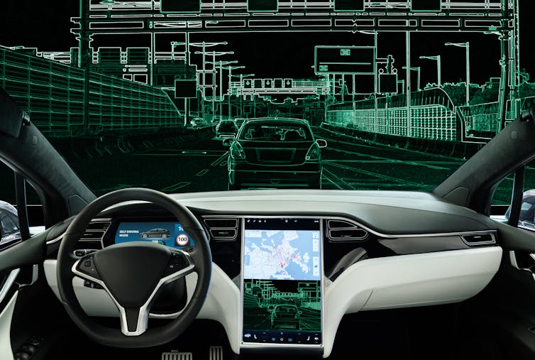 Interior of car looking out at virtual world.