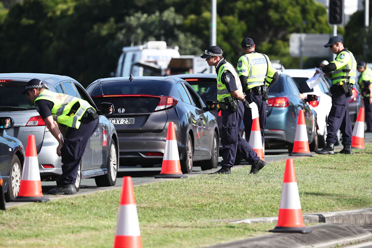 A police checkpoint at the Queensland-NSW border.