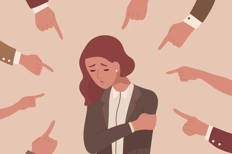 Cartoon of a sad woman with a circle of pointed fingers around her.