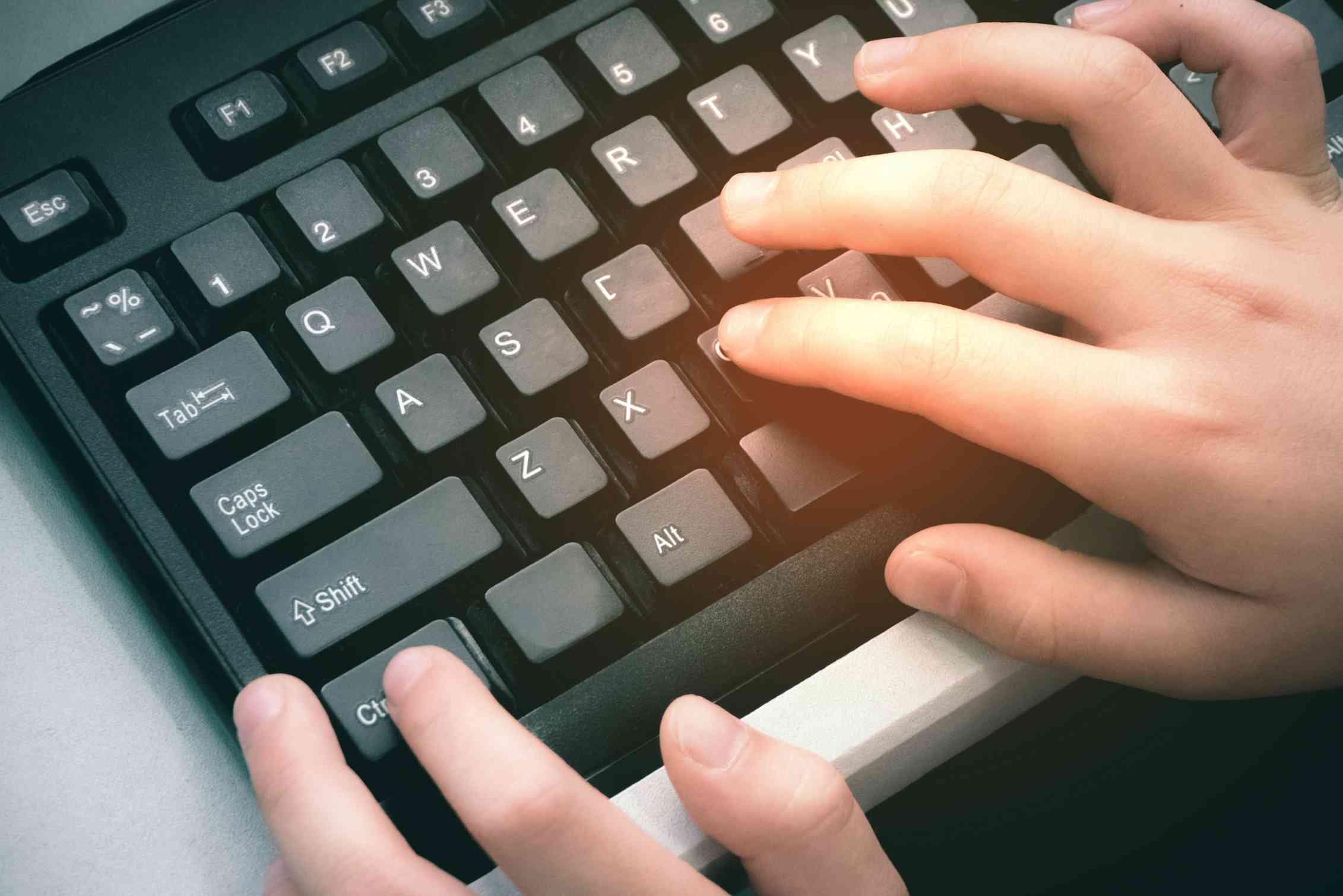 Hands on a keyboard using the Ctrl C copy function