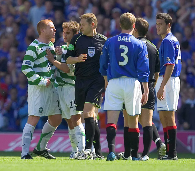 Neil Lennon as a player arguing with a referee, among other Celtic and Rangers players