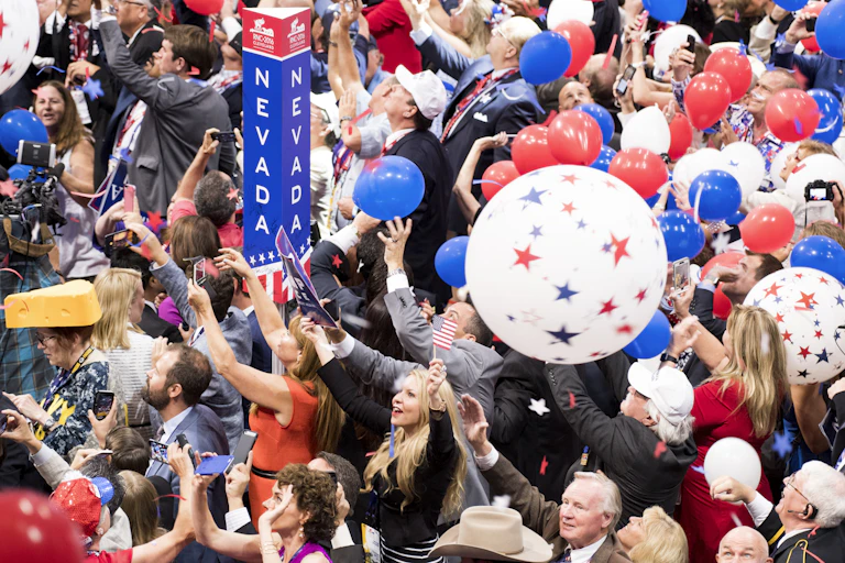 Delegates celebrating at convention after Trump accepted presidential nomination.