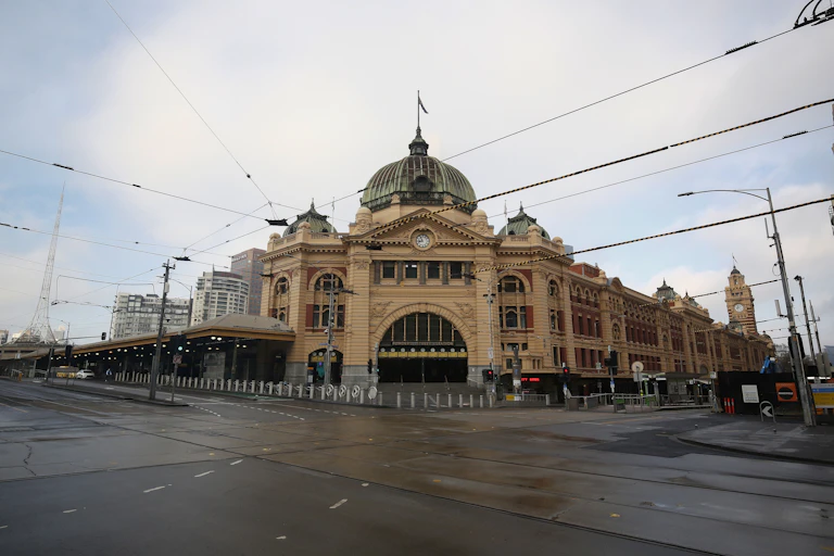Deserted street in front of Melbourne's Flinders Street Station.