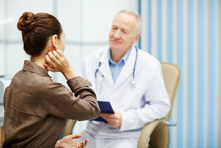 A doctor interviews a patient.