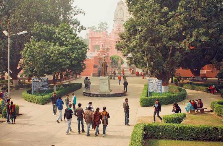 Students gather at a university in India.