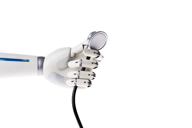 Robot hand holding a stethoscope