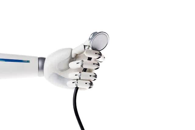 Robot hand holding a stethoscope