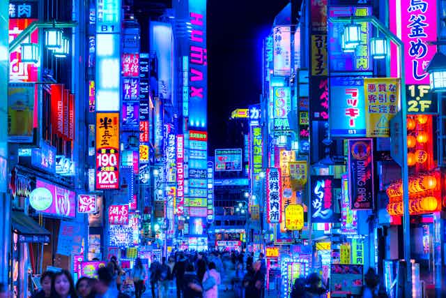 Hundreds of neon signs at night in Tokyo.