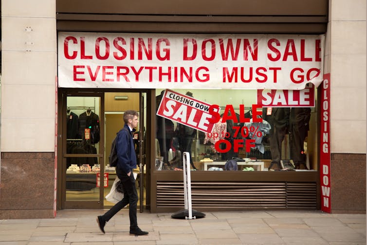 Closing down sale sign in a shop window.