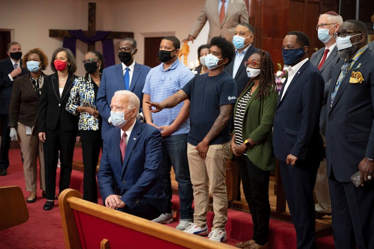Joe Biden with a group of people at the  Bethel AME Church in Wilmington, Delaware.