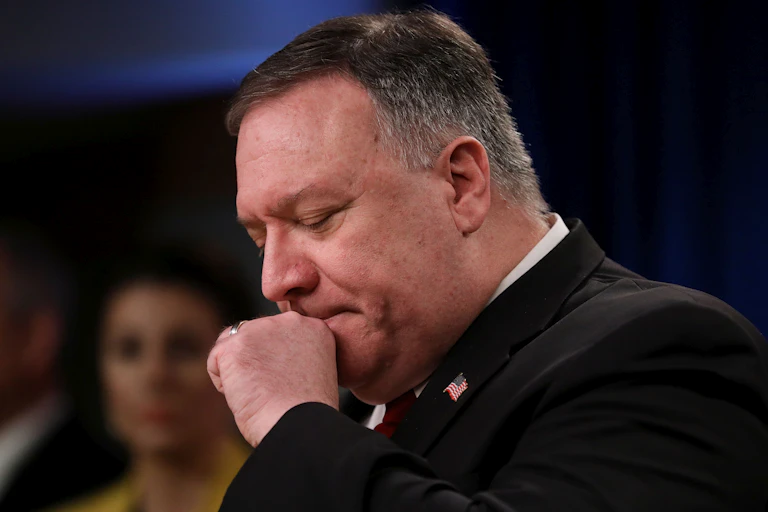 US Secretary of State Mike Pompeo clears his throat at a news conference at the State Department in Washington, DC on April 7, 2020.