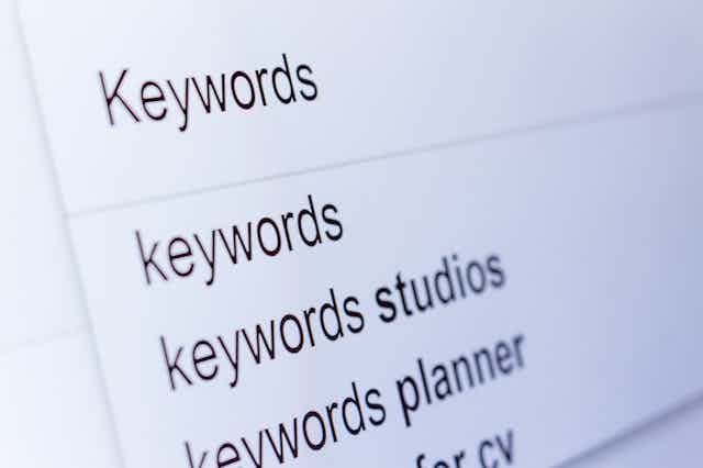 A search engine bar, with the word "keywords" entered and suggestions below.