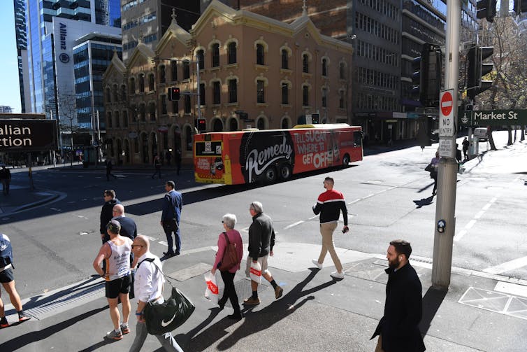 People crossing the road in the Sydney CBD