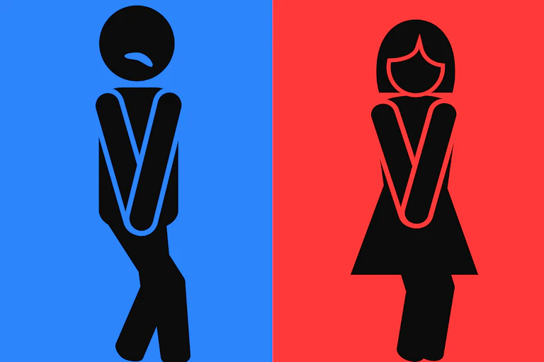 Humorous toilet sign, man and woman bursting for the loo