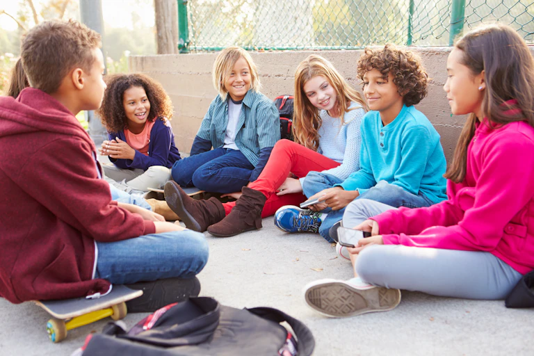 Picture of a group of children talking.