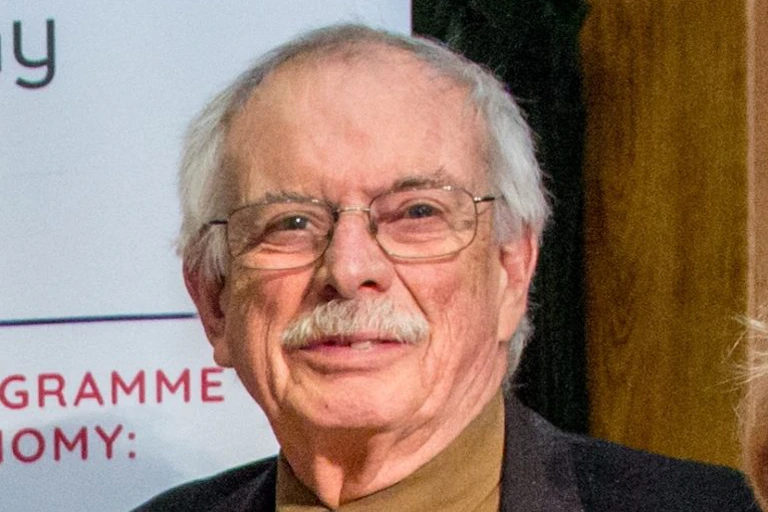 Economist John Weeks at an event.