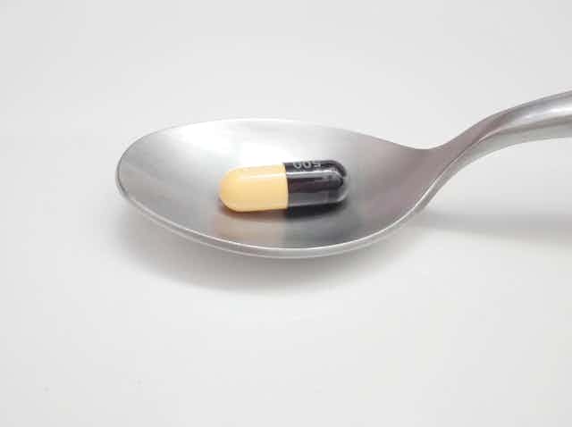 Pill on a spoon