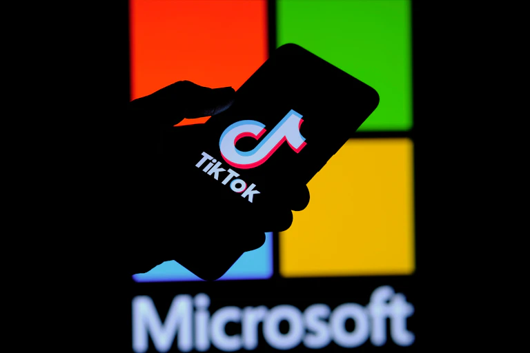 TikTok phone screen over Microsoft background