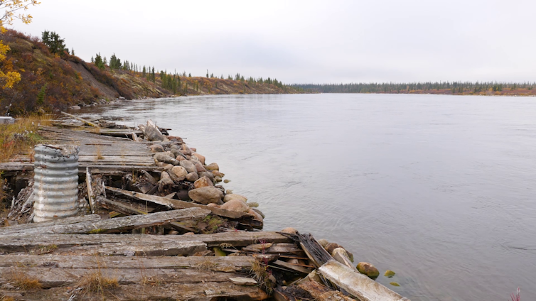 A derelict wharf on a river