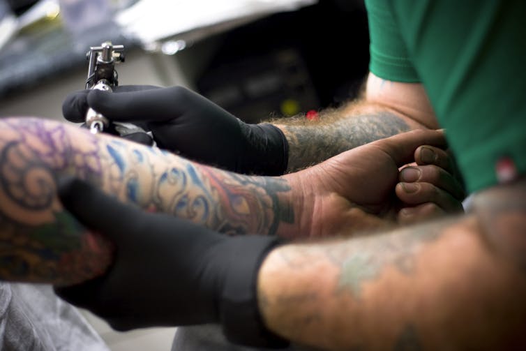 who owns the copyright to your tattoo?