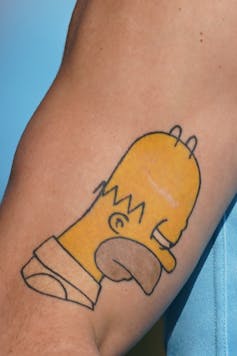 who owns the copyright to your tattoo?
