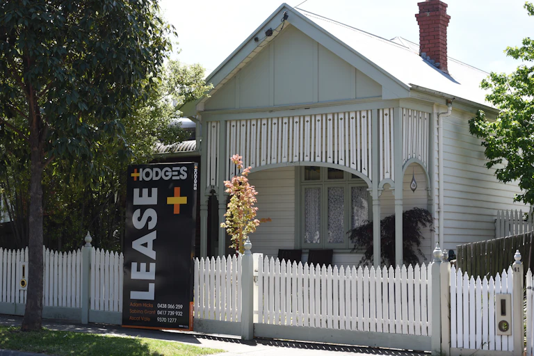 For lease sign in front of house