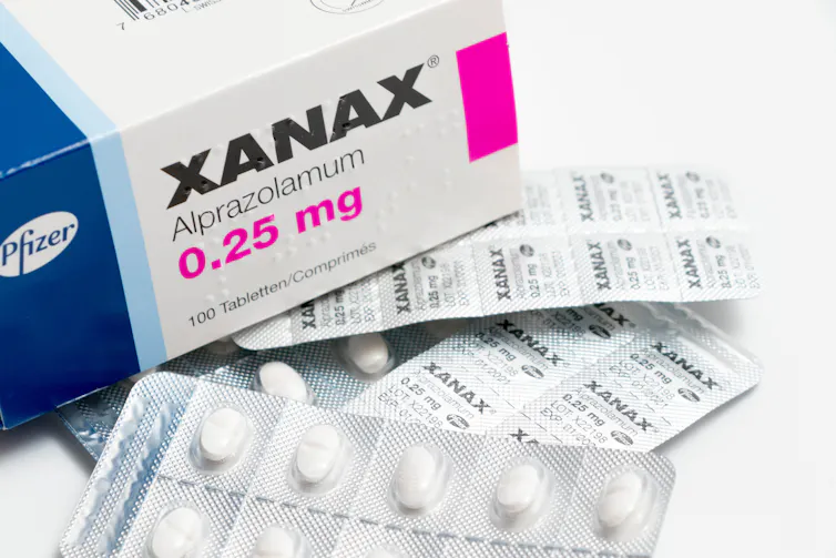 A Xanax box and tablets.