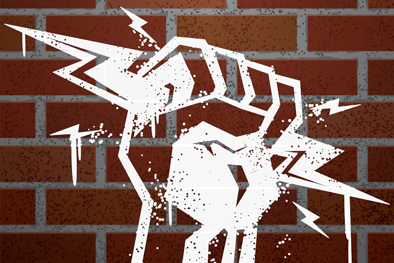 stencil of fist holding lightning bolts with brick background