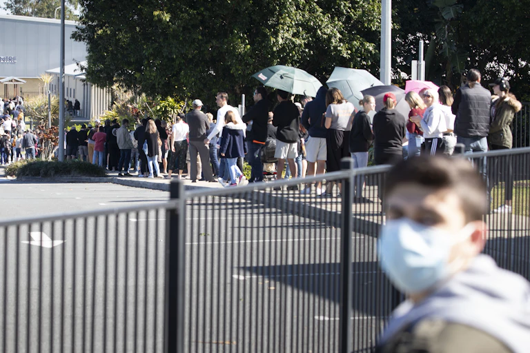 A queue of people waiting to get tested for COVID-19