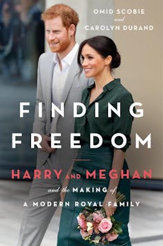 Front cover of 'Finding Freedom', Harry and Meghan smiling for cameras
