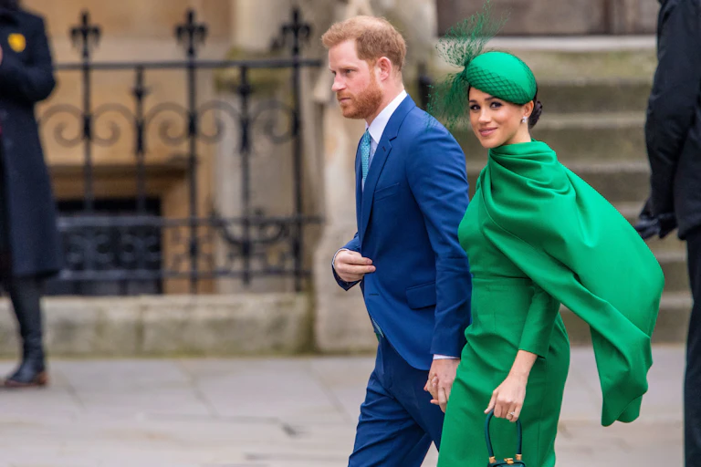 Harry and Meghan at a public event before quitting the royals